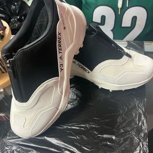 Size 8 men adidas colors white and black. They have minor imperfections